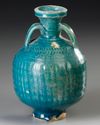 A TURQUOISE-BLUE GLAZED STORAGE JAR, PERSIA, 11TH CENTURY