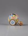A small Chinese painted enamel trompe l'oeil snuff bottle