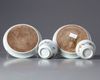 A pair of Chinese famille verte cups and saucers