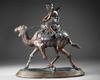 A BRONZE FIGURE OF A RIDER ON CAMEL, 19TH CENTURY