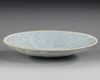 A CHINESE 'QINGBAI' FLOWER-FORM SAUCER DISH, SONG DYNASTY (960-1279)