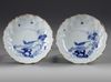 A PAIR OF BLUE AND WHITE KO-SOMETSTUKE SAUCER-DISHES, TIANQI - CHONGZHEN PERIOD (1621 -1644)