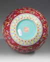 A CHINESE FAMILLE ROSE RUBY GROUND VASE, 19TH-20TH CENTURY