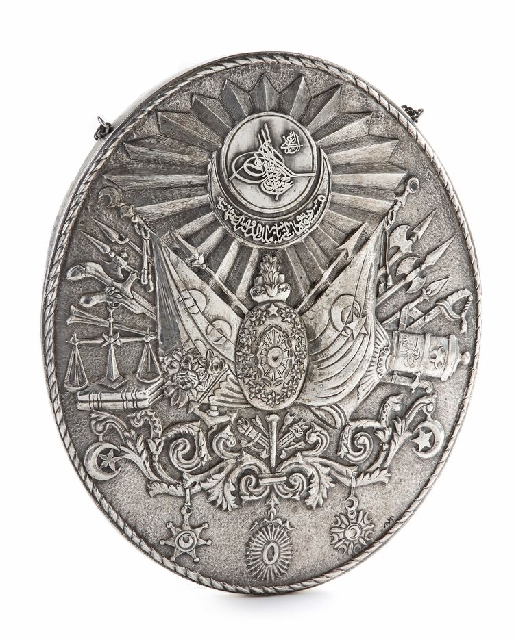 AN OTTOMAN SILVER MOUNTED MIRROR