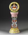 A CHINESE FAMILLE ROSE BUDDHIST EMBLEM ALTAR ORNAMENT, 19TH-20TH CENTURY