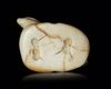 A JEMDET NASR SEAL IN THE FORM OF A RECLINING RABBIT, 3RD MILLENIUM BC
