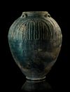 A POST SASSANIAN TURQUOISE GLAZED POTTERY STORAGE JAR, IRAN OR IRAQ, 7TH-8TH CENTURY