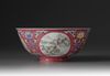 A famille rose ruby-ground medallion bowl
