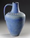 A MONUMENTAL TURQUOISE-BLUE GLAZED POTTERY JUG, SPAIN, CIRCA 15TH-16TH CENTURY