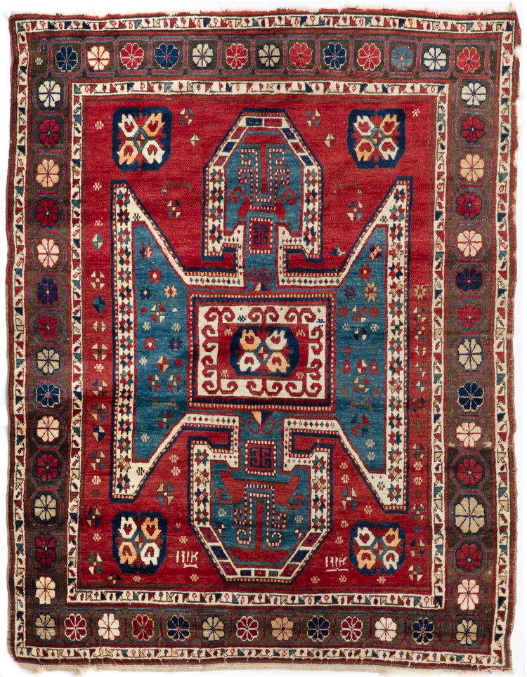 A 'SHIELD' KAZAK, DATED AND SIGNED,19TH CENTURY
