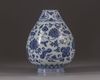 A small blue and white vase