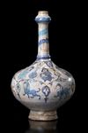 * A MINA'I POTTERY BOTTLE VASE, CENTRAL PERSIA, CIRCA 1200