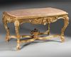 A FRENCH GILT AND CARVED WOOD CENTER TABLE, 19TH CENTURY