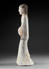 A LARGE TERRACOTTA STATUE OF A STANDING FEMALE ATTENDANT, CHINA, HAN DYNASTY (206 BC-206 AD)