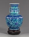 A Chinese gasoline green ground blue and white vase