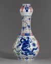 A Chinese wucai glazed 'dragons' garlic-head vase