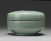 A Korean celadon-glazed ‘chrysanthemum’ round box and cover