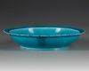 A CHINESE 'DRAGON' TURQUOISE GLAZED DISH,QING DYNASTY (1644–1911)