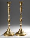 A PAIR OF LARGE QAJAR ENGRAVED BRASS CANDLESTICKS, IRAN, 19TH CENTURY