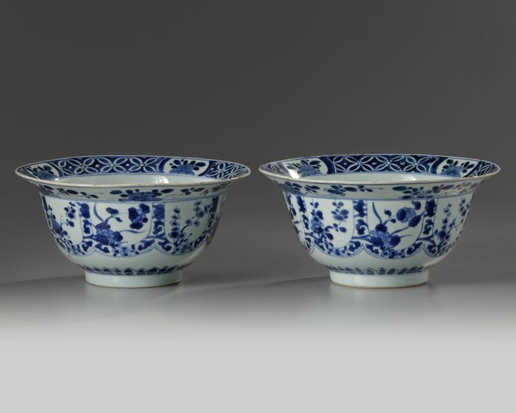A pair of Chinese blue and white ‘floral’ klapmuts bowls