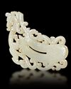A WHITE JADE SHIELD-SHAPED PENDANT, HAN DYNASTY (206 BC–220 AD)