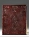 A LEATHER-BOUND BOOK WITH ISLAMIC TRANSCRIPTS