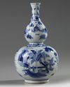 A Chinese blue and white double gourd vase