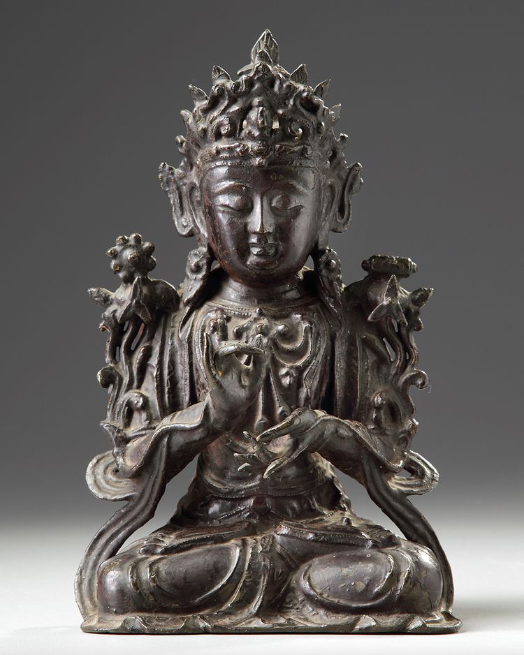 A CHINESE GILT LACQUERED BRONZE GUANYIN