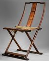 A FINE AND RARE HUANGHUALI FOLDING CHAIR, CHINA 17TH CENTURY