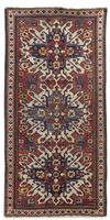 A CAUCASIAN KAZAK ADLER (CHALEBERD) RUG, 19TH CENTURY