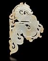 A PALE CELADON JADE DRAGON PENDANT, CHINA, HAN DYNASTY (206 BC–220 AD)