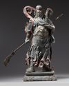 A large gilt and polychrome decorated bronze figure of Guandi