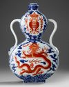 A CHINESE IRON-RED DECORATED BLUE AND WHITE VASE, 19TH-20TH CENTURY