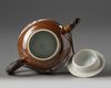 A Chinese cafe au lait ground famille rose 'Batavia ware' teapot and cover