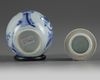 A small Chinese blue and white jar and a cover