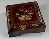 A set of Chinese famille rose 'Immortals' sweetmeat dishes in a lacquered box