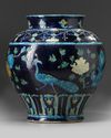 A CHINESE BLUE-GROUND FAHUA WINE JAR, CHINA, MING DYNASTY (1368-1644) OR LATER