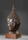 A BRONZE HEAD OF BUDDHA, THAILAND 19TH CENTURY
