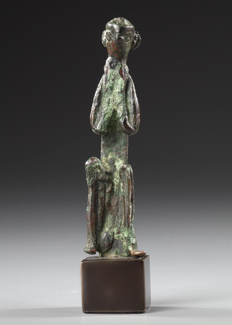 A WESTERN ASIATIC BRONZE SEATED FIGURE, CIRCA 2ND MILLENNIUM  B.C.