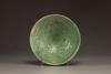 A CHINESE YAOZHOU CARVED GREEN GLAZED CONICAL BOWL, LIAO DYNASTY (907-1125)