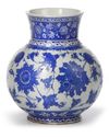 THE STYLE OF BABA NAKKAS IZNIK BLUE AND WHITE JAR, 20TH CENTURY