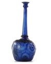 A LARGE MOULD-BLOWN BLUE GLASS BOTTLE-VASE OR SPRINKLER, PERSIA, 12TH CENTURY