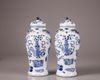 A pair of blue and vases with cover
