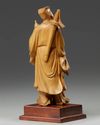 A Chinese root wood carving of an Immortal