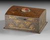 AN INDO-PERSIAN METAL CASKET WITH GILT FLORAL DECORATION AND AGATE CABOCHON, 20TH CENTURY
