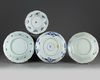 Four Chinese blue and white foliate-rimmed 'scholar landscape' dishes