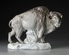 A PORCELAIN SCULPTURE OF A BISON, 20TH CENTURY