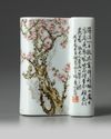 A Chinese famille rose 'prunus' brush rest