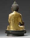 A Chinese gilt bronze figure of Shakyamuni