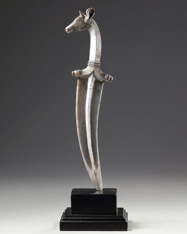 A MUGHAL METAL DEER HILTED DAGGER